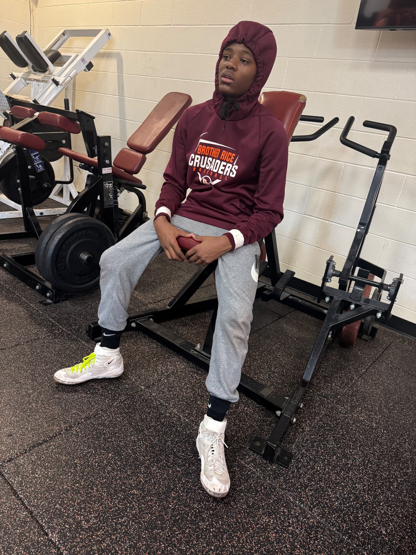 Duane in the Brother Rice weight room between sessions